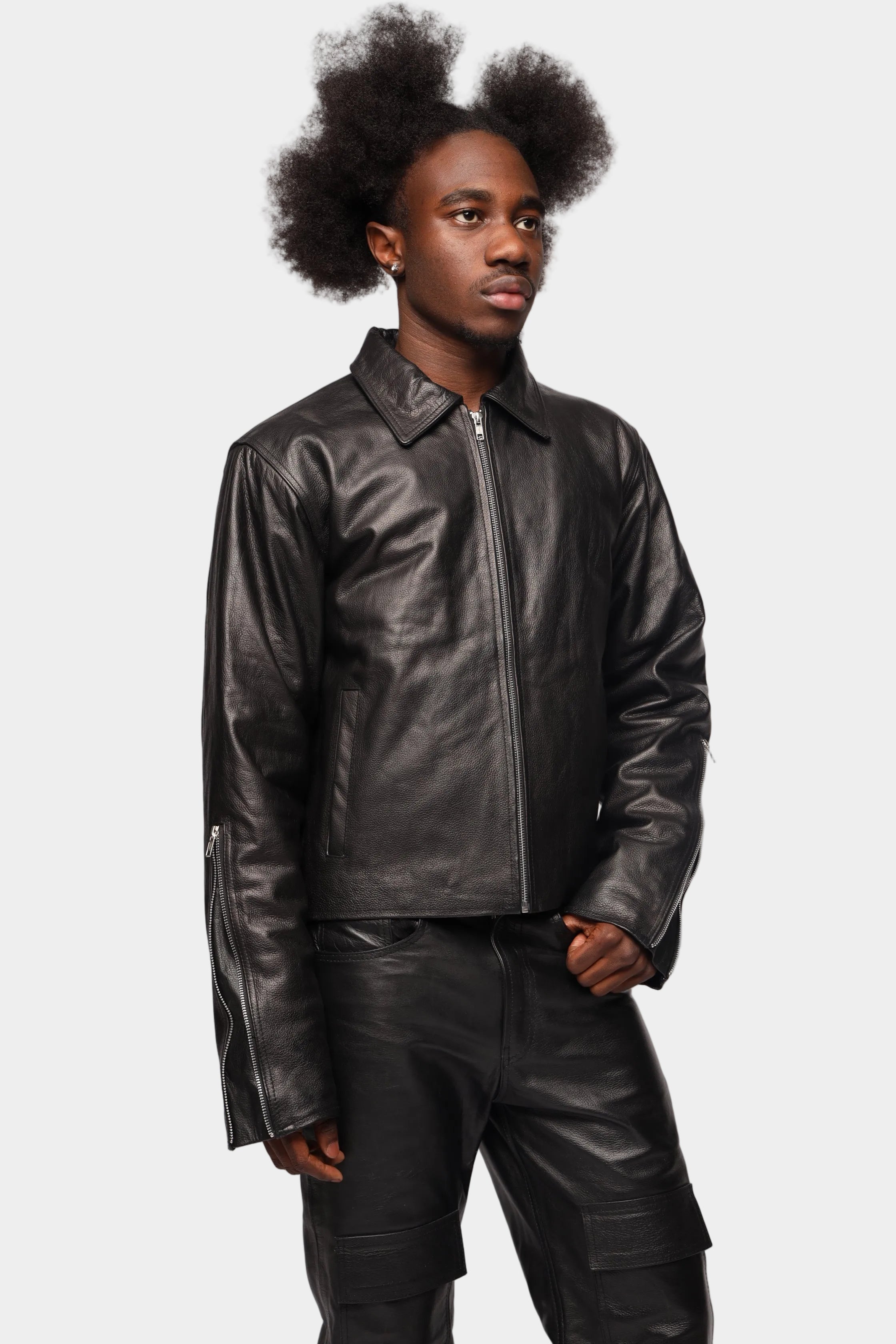 Kaleb A. Bearden zipped leather jacket with a sleek design, featuring a front zipper and smooth leather texture.