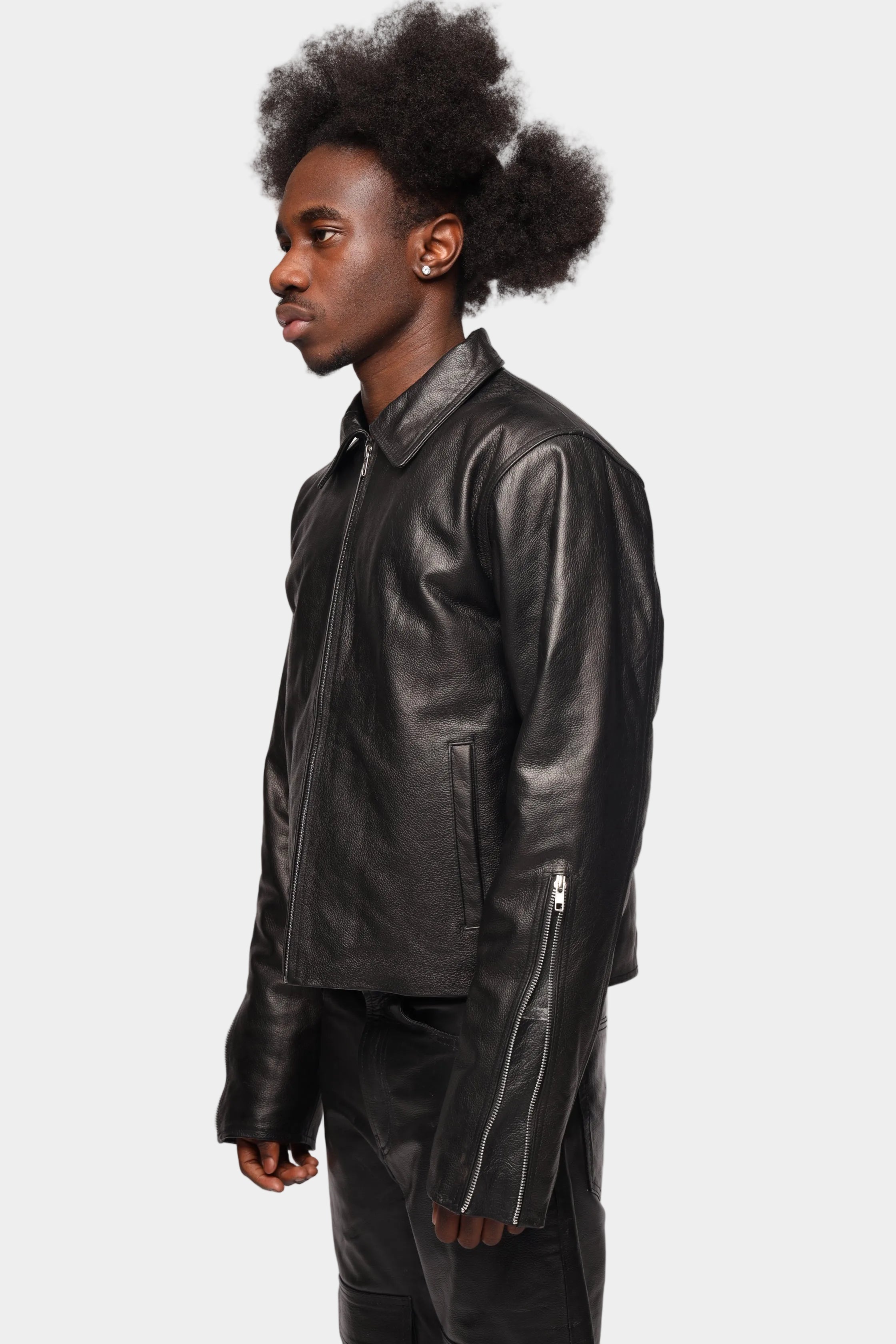 Kaleb A. Bearden zipped leather jacket showing front view with detailed stitching and sleek black leather finish.