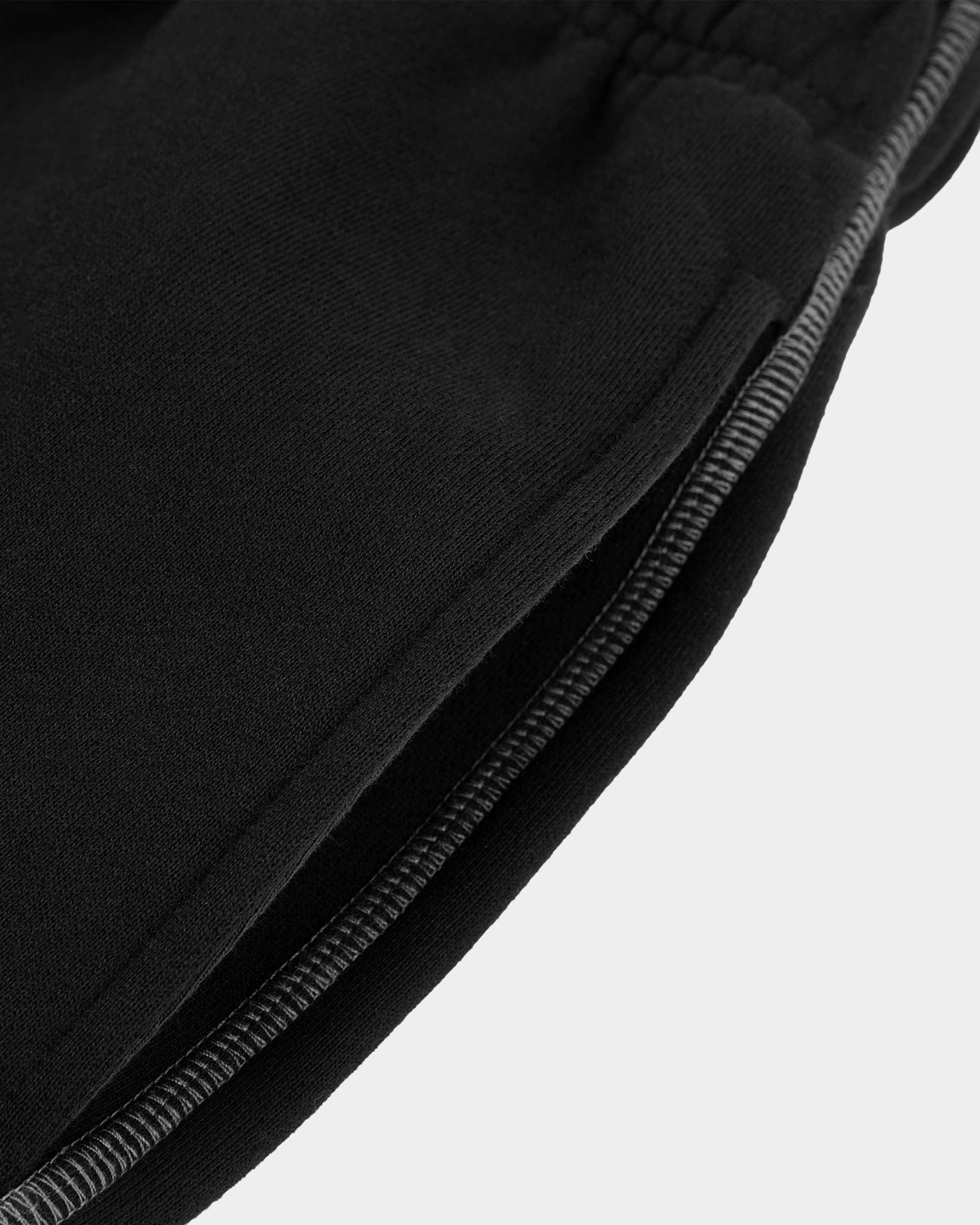 Black and white contrast sweatpants by Kaleb A. Bearden featuring relaxed fit and comfortable fabric for casual wear.
