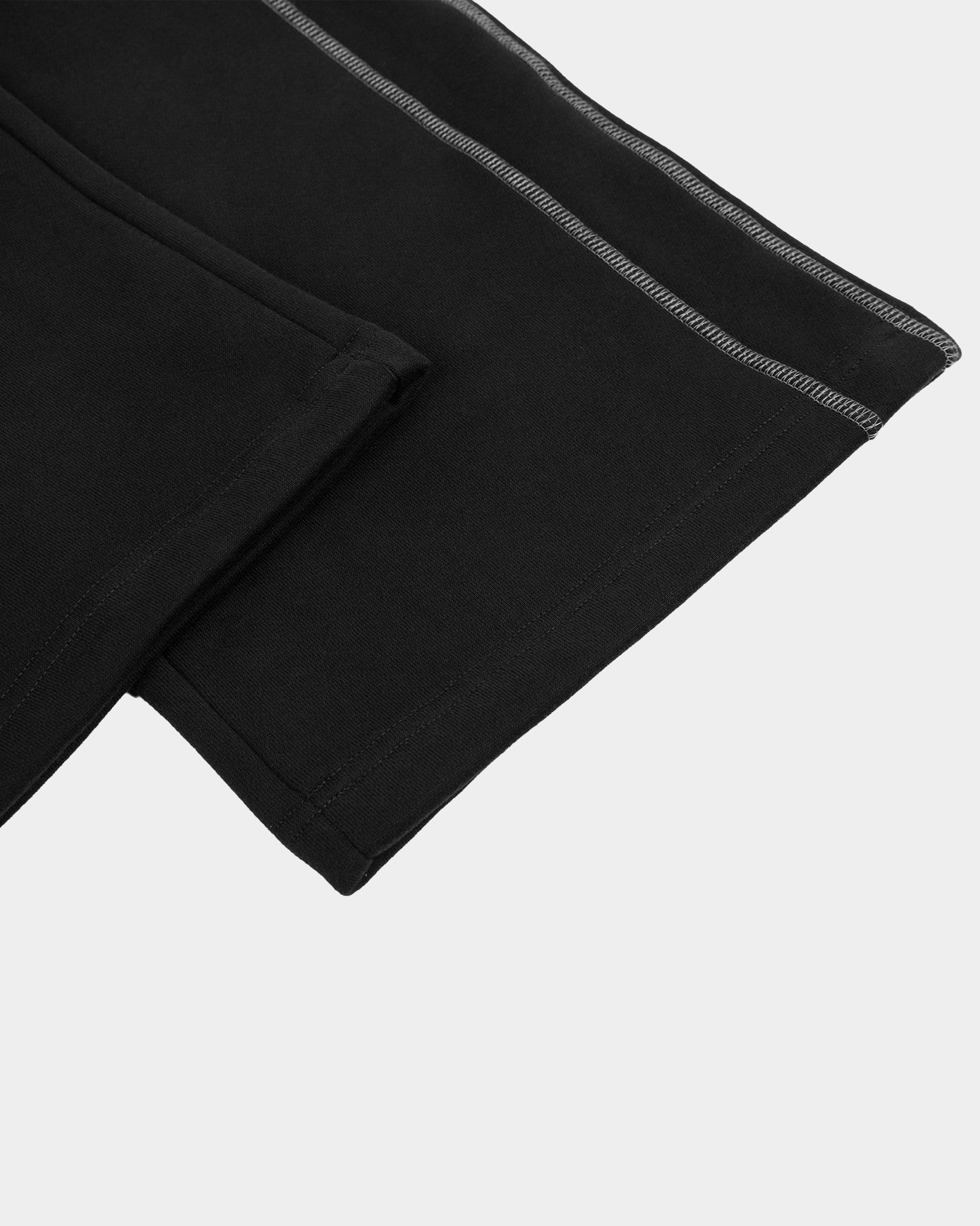 Kaleb A. Bearden Blakely Contrast Sweatpant showing black and white color blocking, elastic waistband, and relaxed fit.