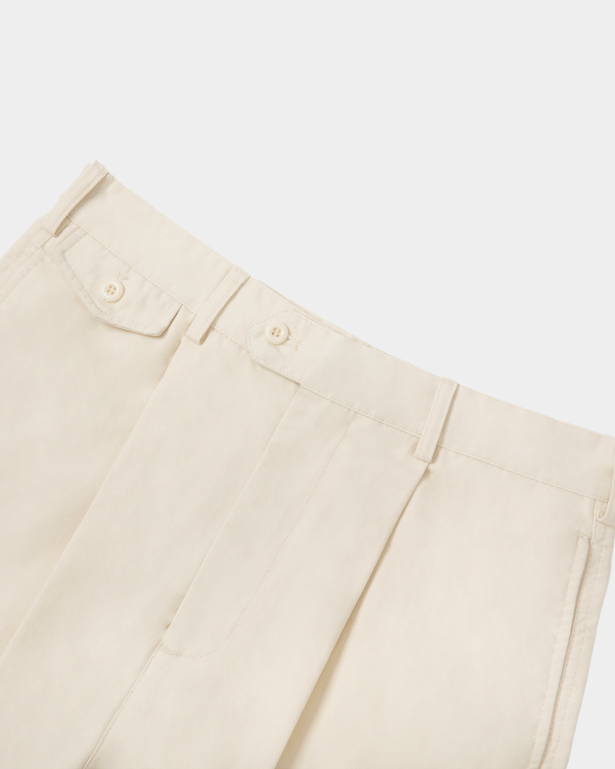 Kaleb A. Bearden pleated blue home trousers with relaxed fit and elastic waistband, shown on a hanger or model.