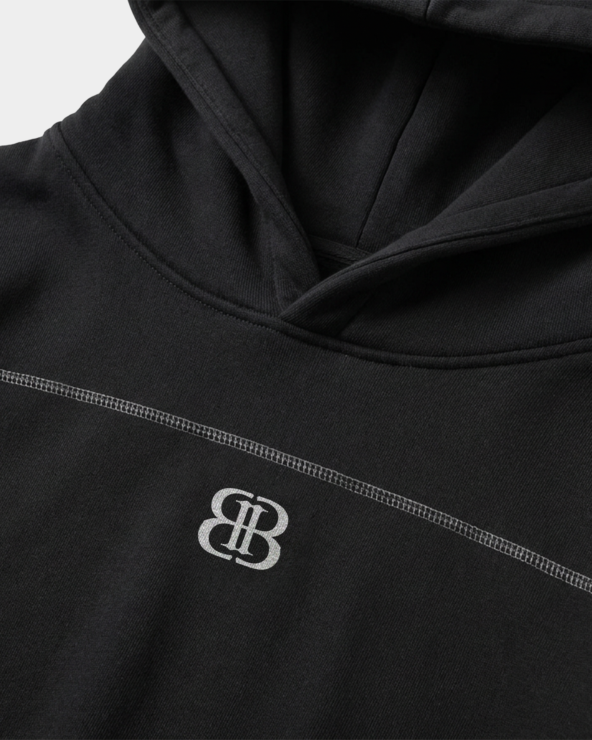 ODMPOD BB Monogram Contrast Hoodie featuring bold logo design, black and white color scheme, and comfortable casual fit.