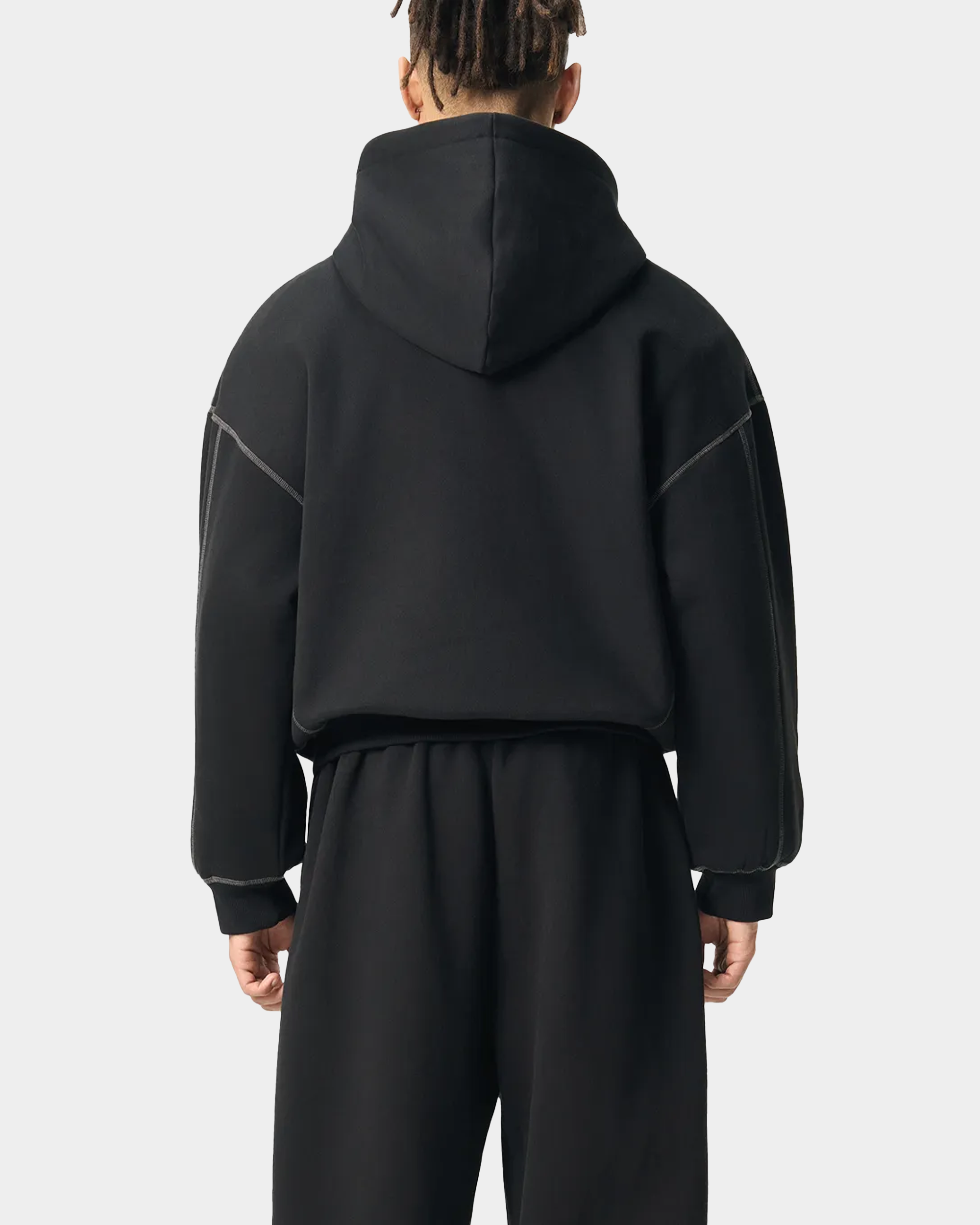 Black ODMPOD BB Monogram Contrast Hoodie with bold logo print and contrasting hood lining, casual streetwear style.