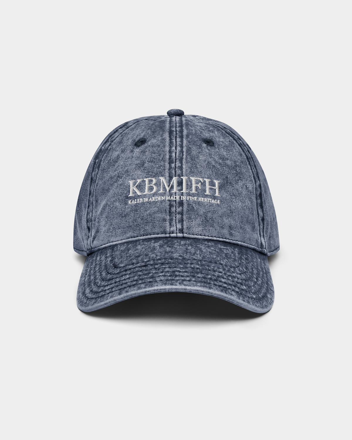 Kaleb A. Bearden KBMIFH Twill Cap featuring a classic design with a curved brim and adjustable strap in khaki color.