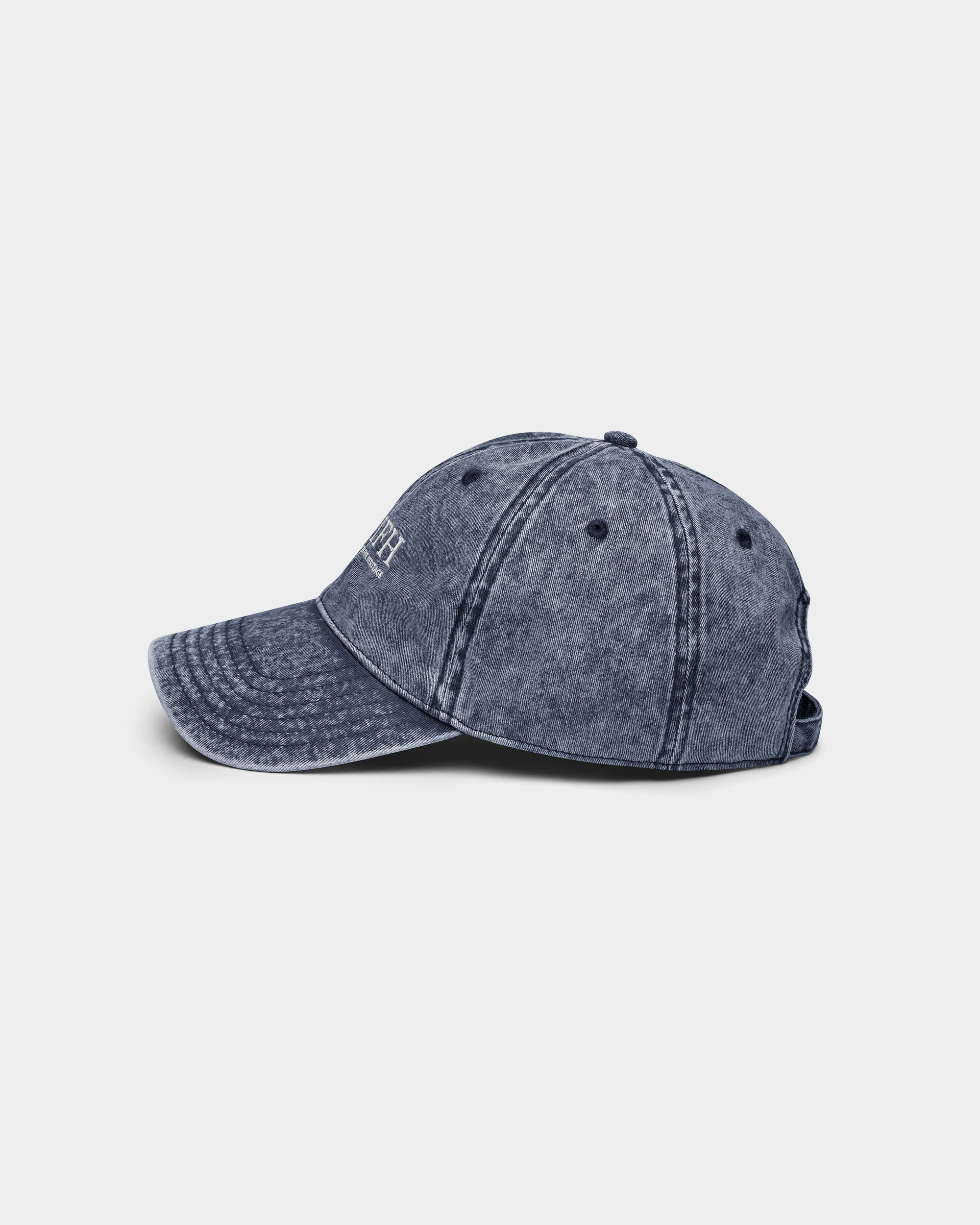 Kaleb A. Bearden twill cap featuring a classic six-panel design and adjustable strap, shown in a neutral color.