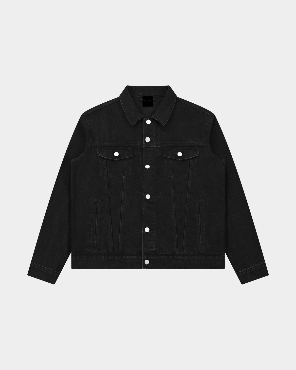Men's heavyweight denim trucker jacket by ODMPOD featuring classic fit, button closure, and chest flap pockets.