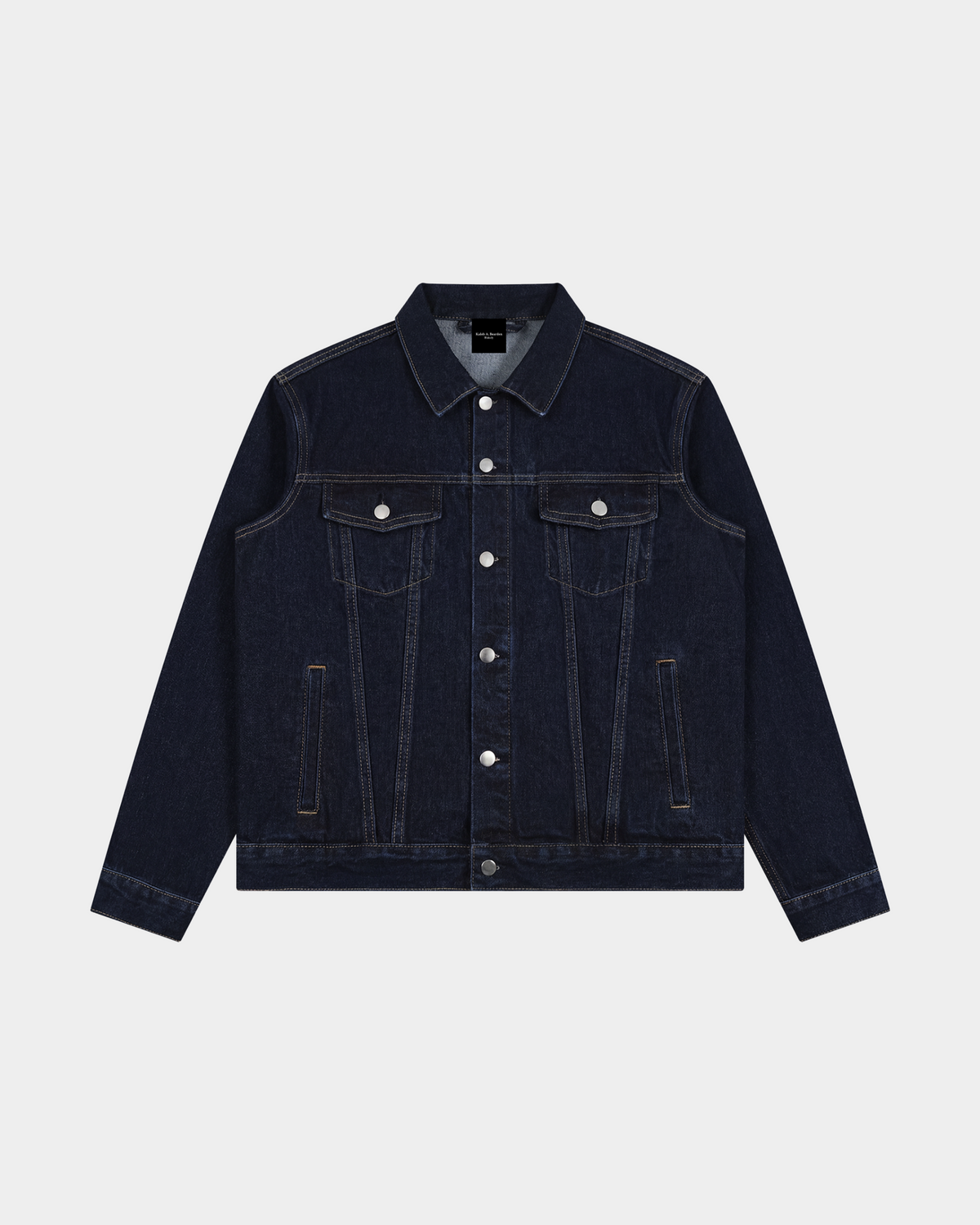 ODMPOD heavyweight denim trucker jacket displayed on a hanger, showcasing classic design and durable fabric.