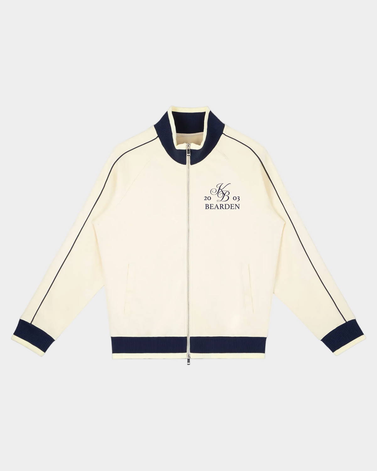 ODMPOD Home Blues Track Jacket in navy blue with white stripes, featuring a zip-up front and sporty design.