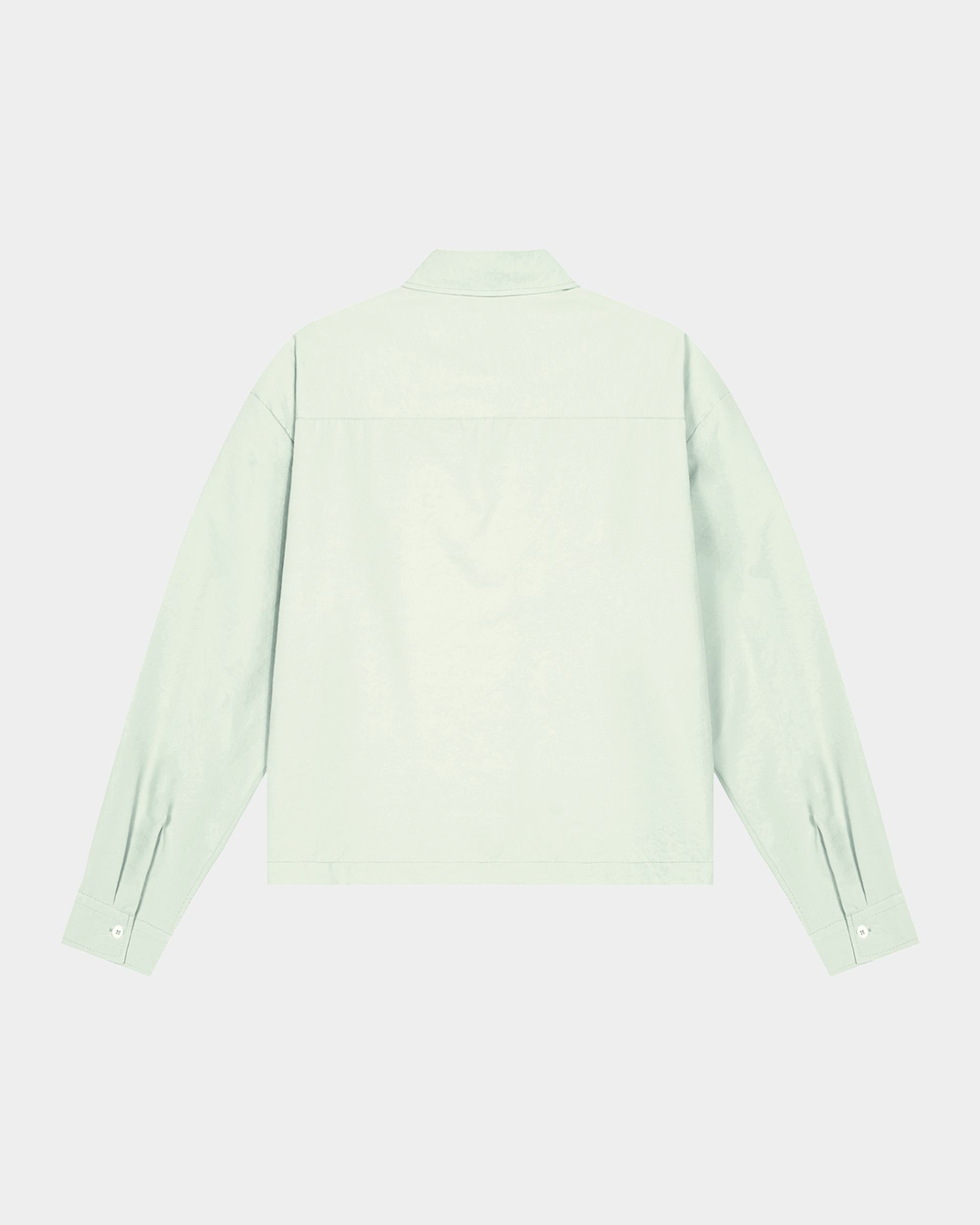 ODMPOD BB Mint Drop Shoulder Shirt featuring a relaxed fit with mint green fabric and drop shoulder design.