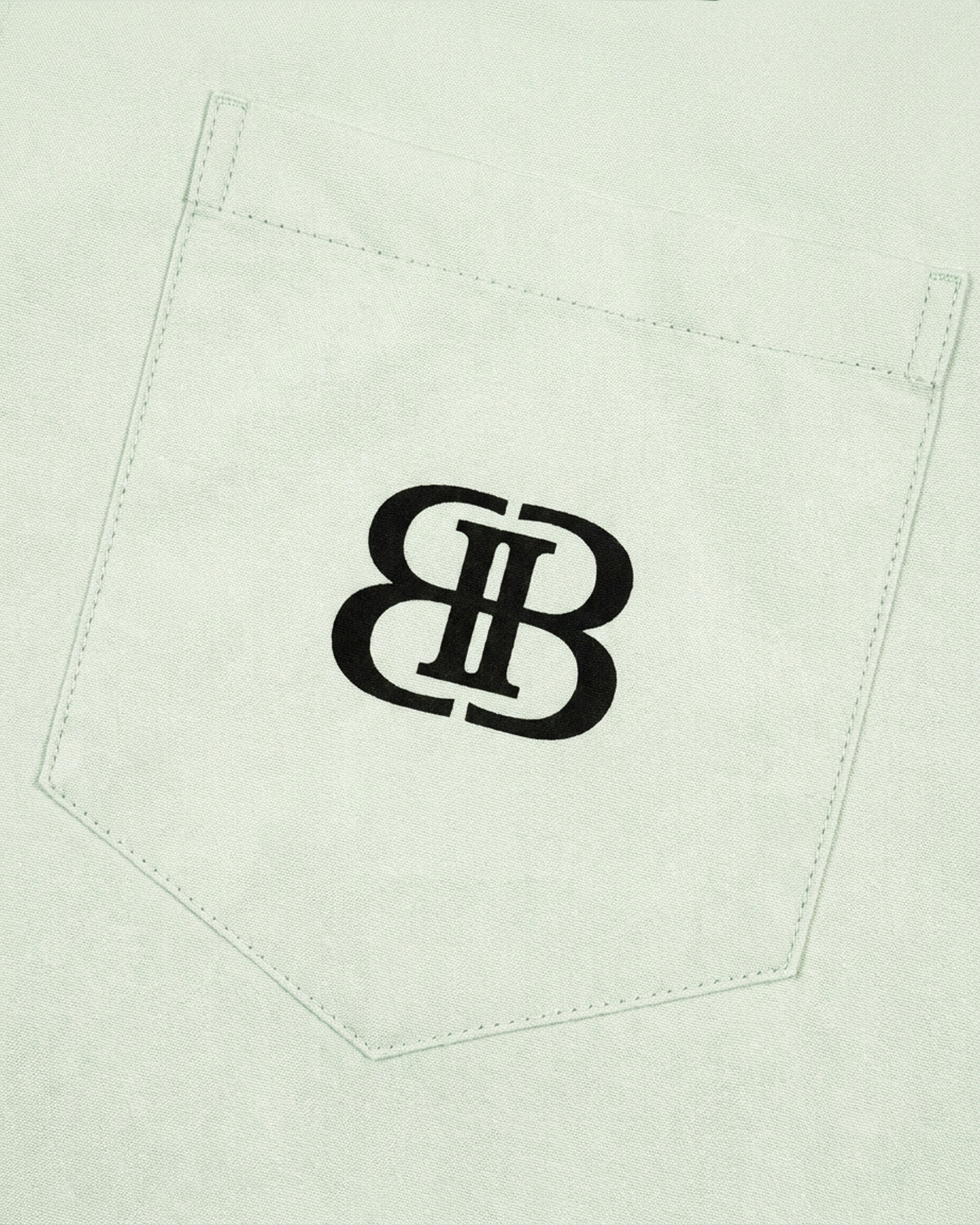 ODMPOD BB Mint Drop Shoulder Shirt showing a relaxed fit with mint green fabric and drop shoulder design.