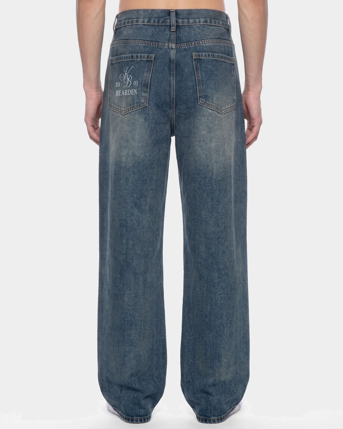 ODMPOD thigh fade straight jeans showing distressed denim with a faded thigh design and straight fit style.
