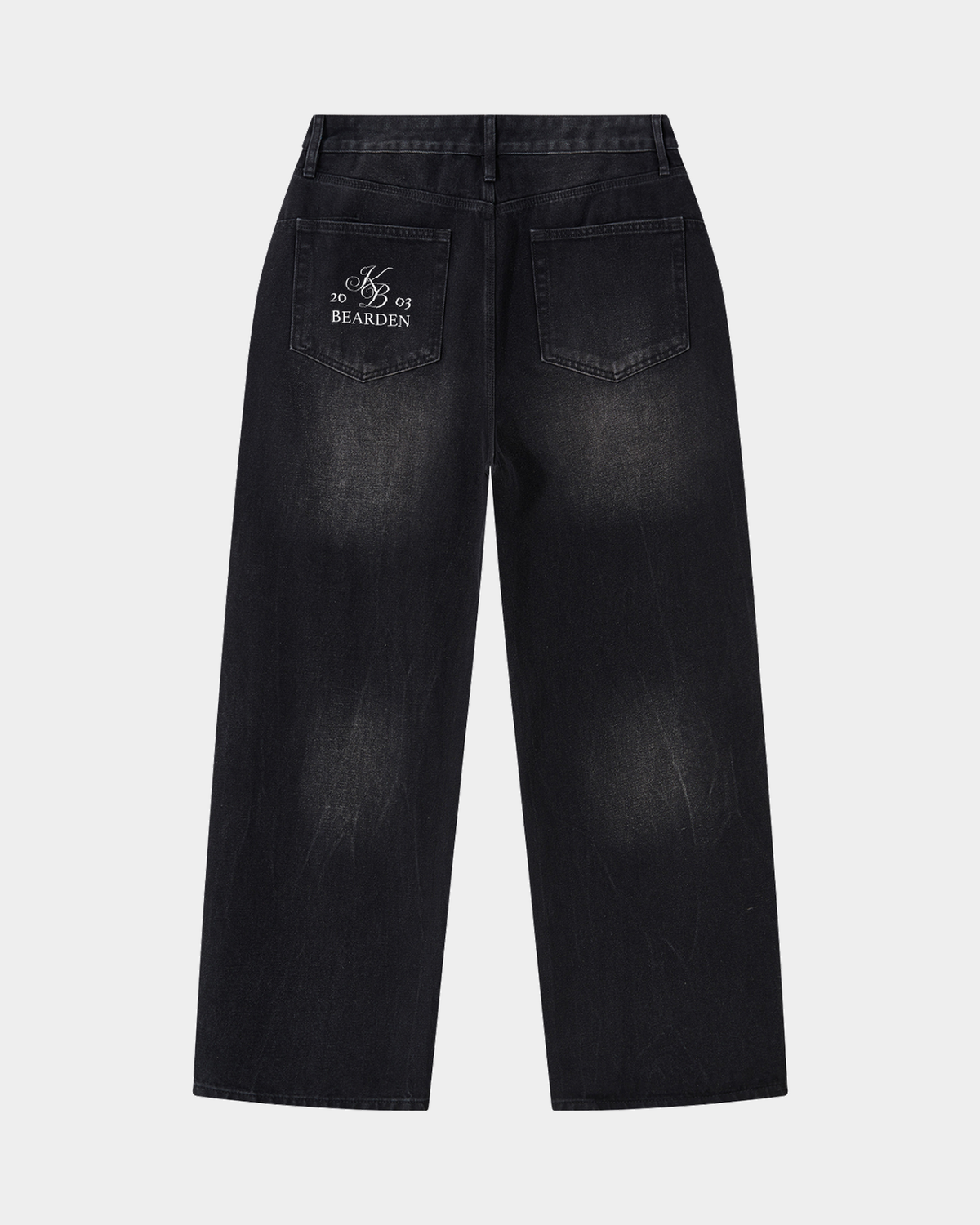 Faded black wide leg jeans from ODMPOD, featuring a relaxed fit and classic denim texture, displayed on a plain background.