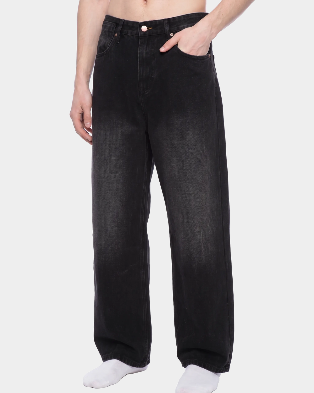Faded black wide-leg jeans by ODMPOD with a relaxed fit and high-rise waist, displayed on a hanger.