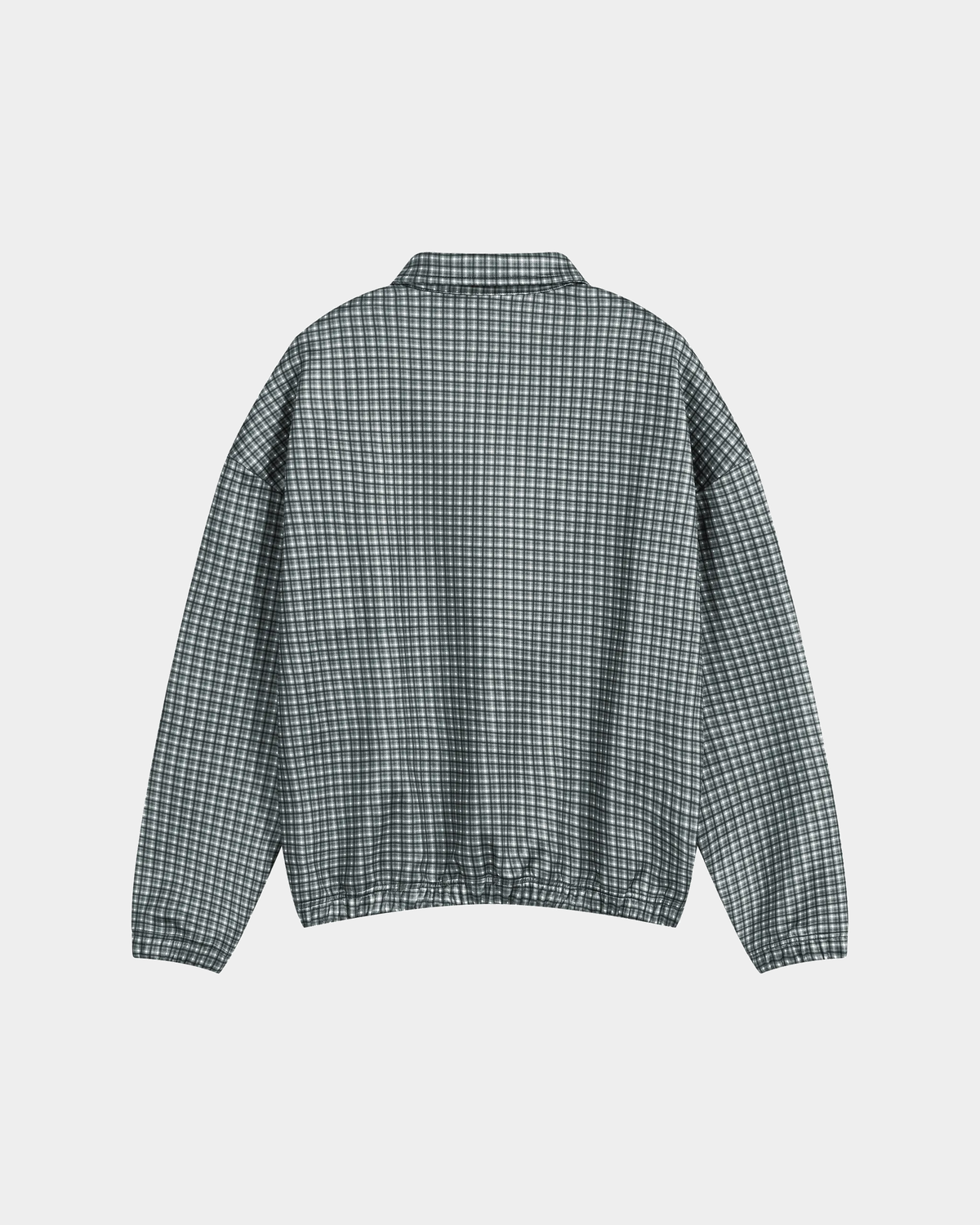 ODMPOD BB plaid blouson jacket with button details and relaxed fit, featuring a classic plaid pattern and lightweight fabric