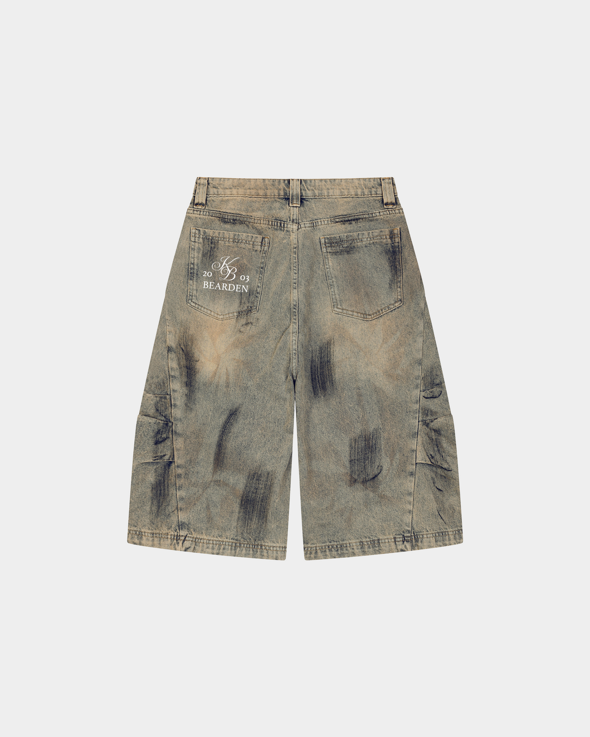 ODMPOD bleach splatter denim shorts with distressed detailing and frayed hem, styled for a casual, edgy look.