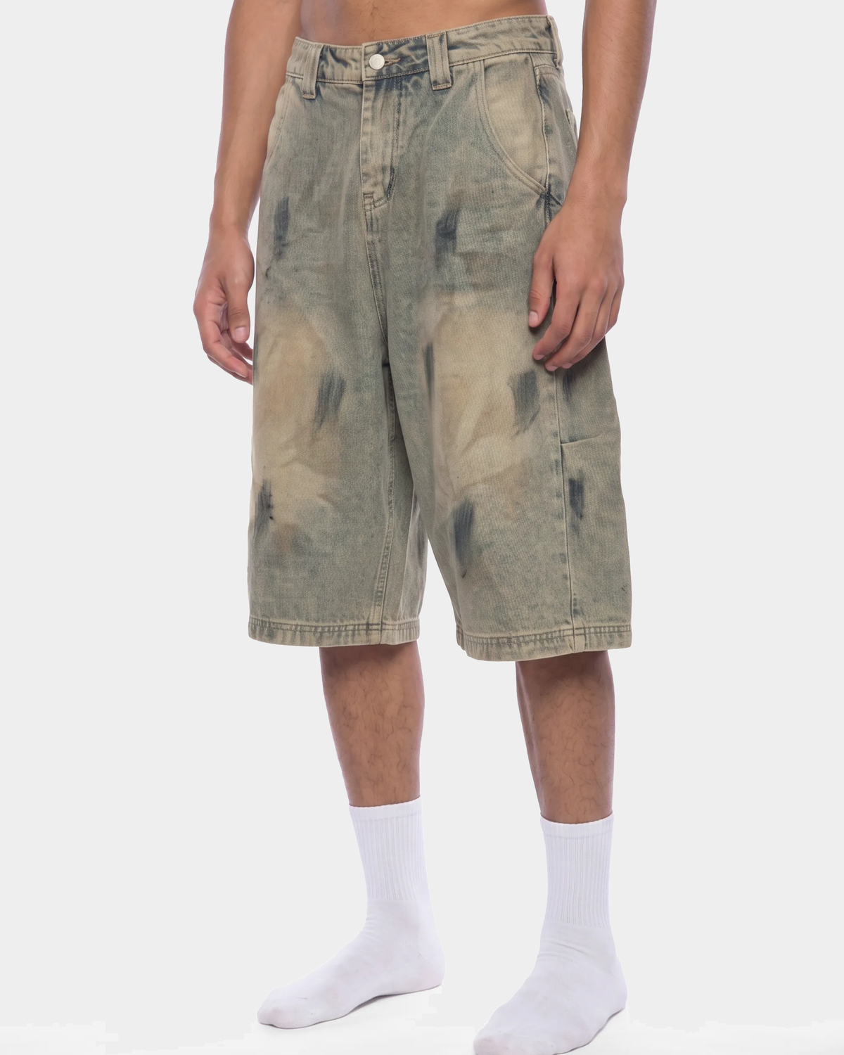 ODMPOD bleach splatter denim shorts featuring distressed denim with bleach-stained design and casual fit.