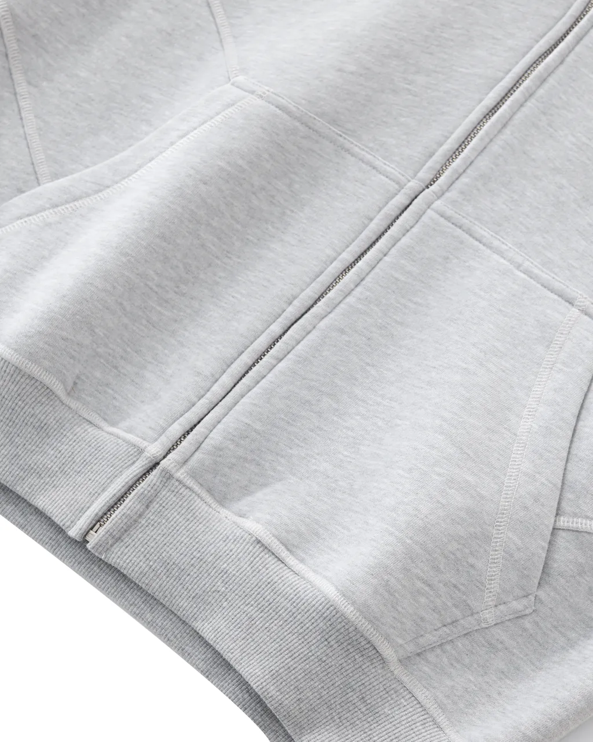 ODMPOD R.S Fleece Zip Hoodie in black, featuring a full front zipper, soft fleece fabric, and adjustable hood for casual comfort.