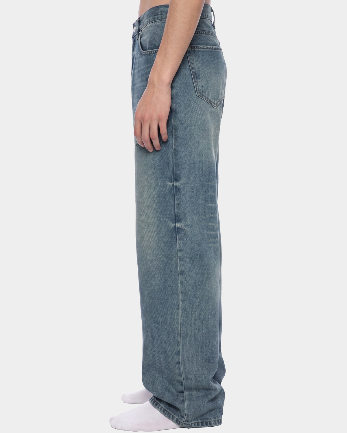 ODMPOD KBMIFH wide leg jeans featuring a high-rise fit and classic denim wash, displayed on a hanger.