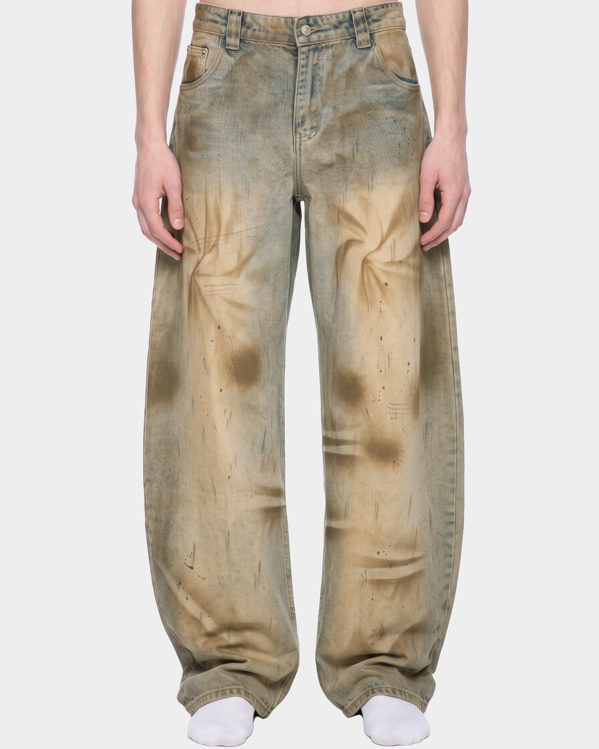 ODMPOD Sunbleach distressed barrel jeans with faded wash and relaxed fit, featuring rolled cuffs and vintage-style distressing.
