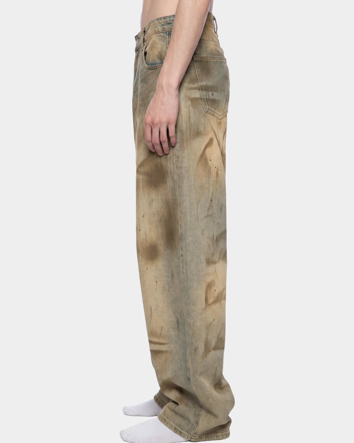 ODMPOD Sunbleach distressed barrel jeans featuring a faded, vintage wash with a relaxed fit and rolled cuffs.