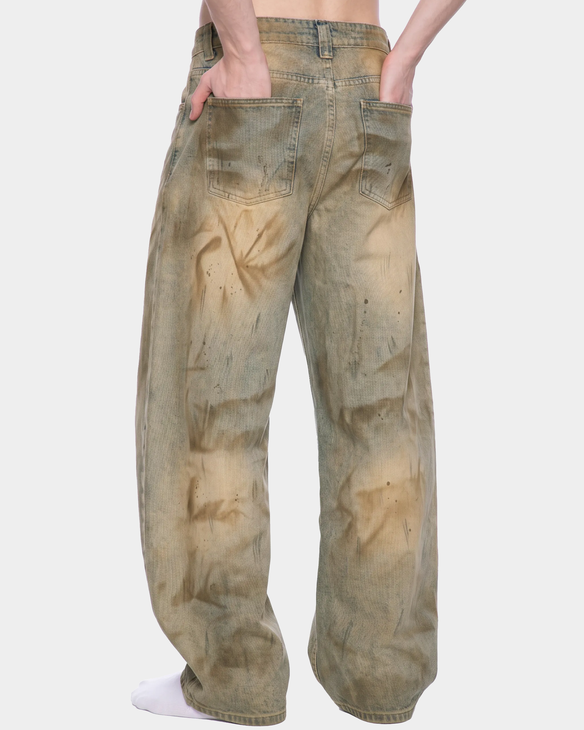 ODMPOD Sunbleach distressed barrel jeans showing faded denim, relaxed fit, and frayed details on a casual style pant.