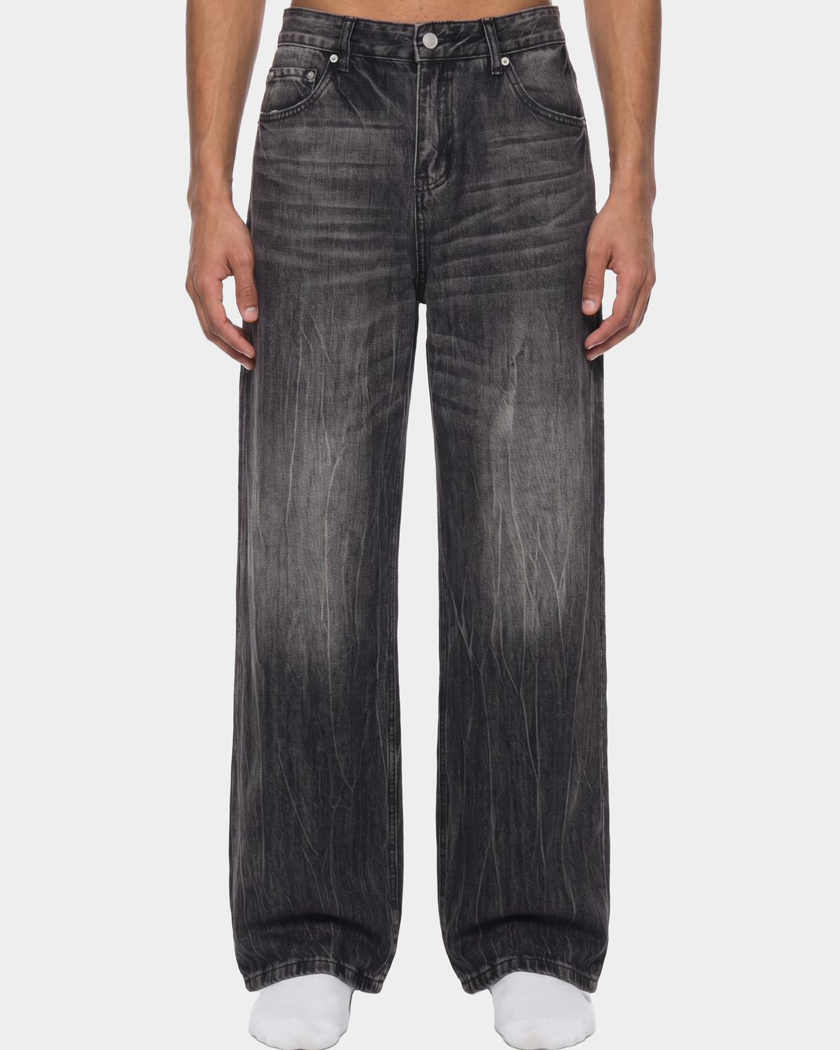ODMPOD streaked wide-leg jeans showing a relaxed fit with streaked denim fabric and high waist design.