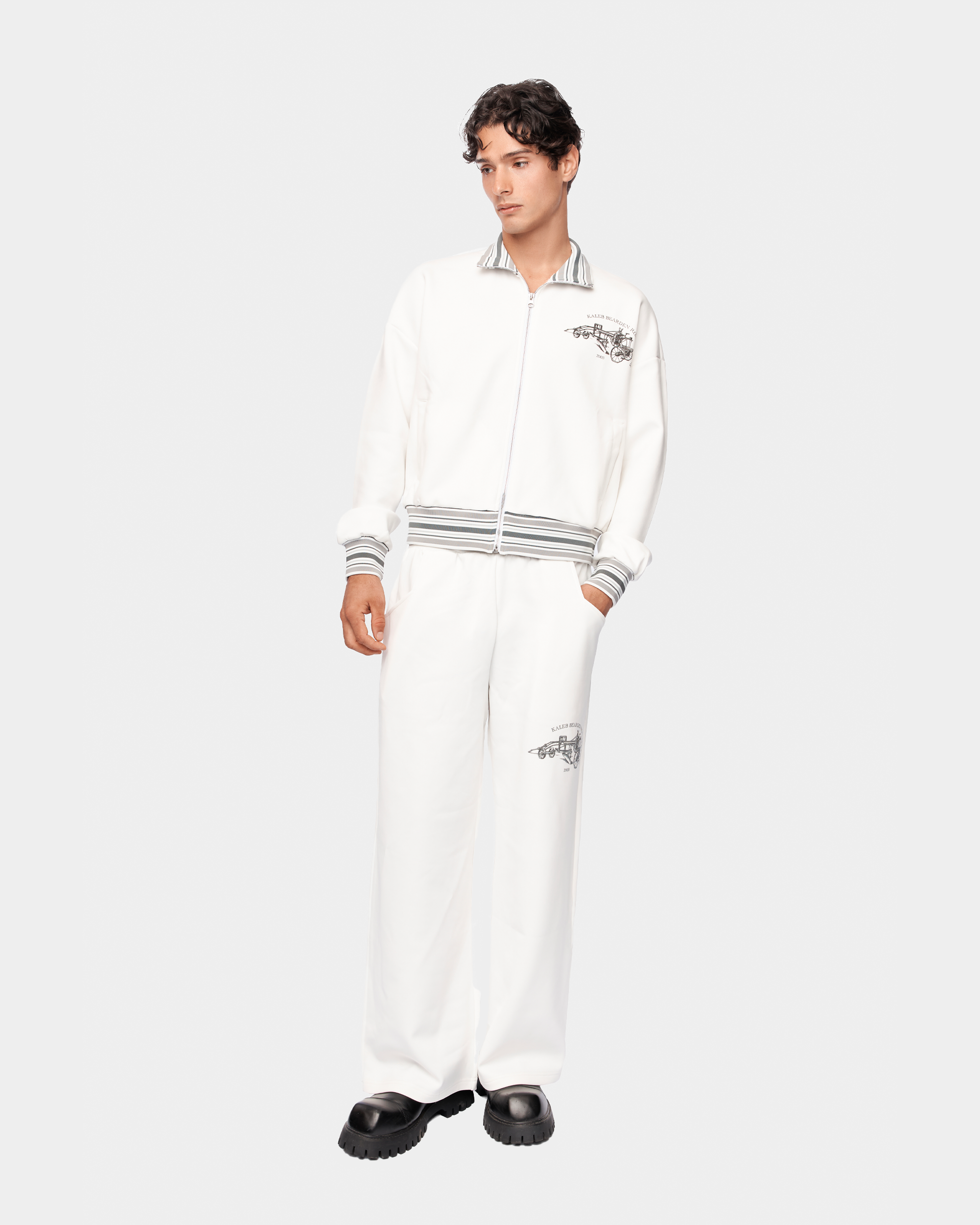 Kaleb A. Bearden Signature Track Jacket featuring a sleek design, zip-up front, and athletic fit in black fabric.