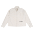 ODMPOD KAB Cream Drop shirt featuring a stylish cream-colored fabric and unique drop shoulder design.