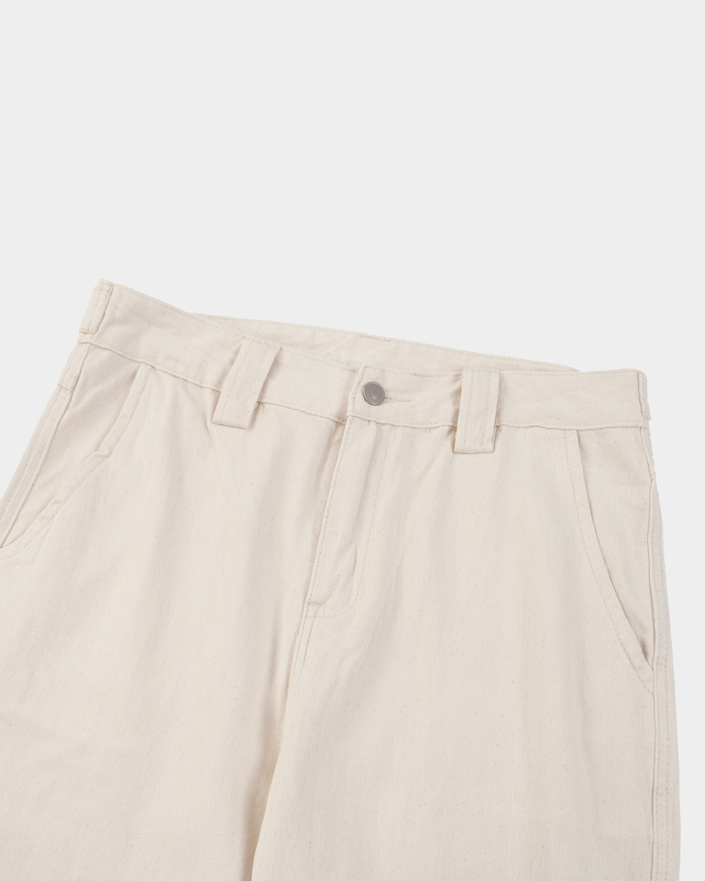 Pair of casual ODMPOD leg jeans hanging on a rack, showcasing their relaxed fit and denim fabric.