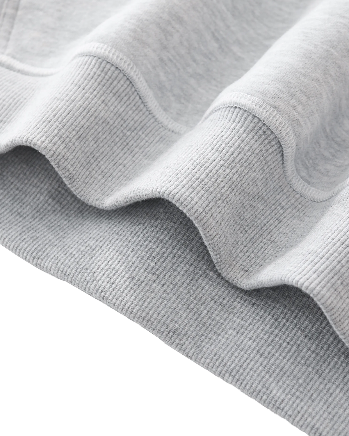 ODMPOD R.S fleece hoodie in gray, featuring a soft fleece fabric and a comfortable hood with front pocket detail.