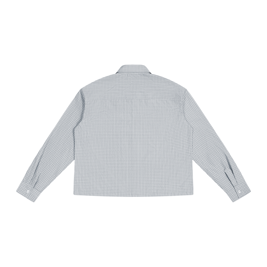 ODMPOD plaid drop shoulder shirt featuring a relaxed fit and casual style, shown in a close-up view of the fabric and design.