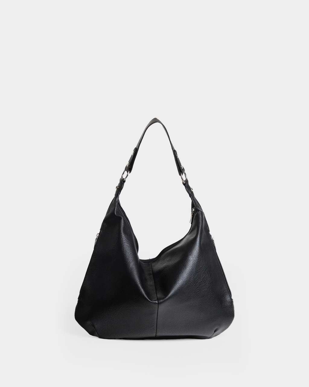Black leather handbag on a light gray background