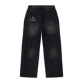 Faded black wide-leg jeans by ODMPOD displayed on a hanger, showcasing relaxed fit and stylish casual denim.