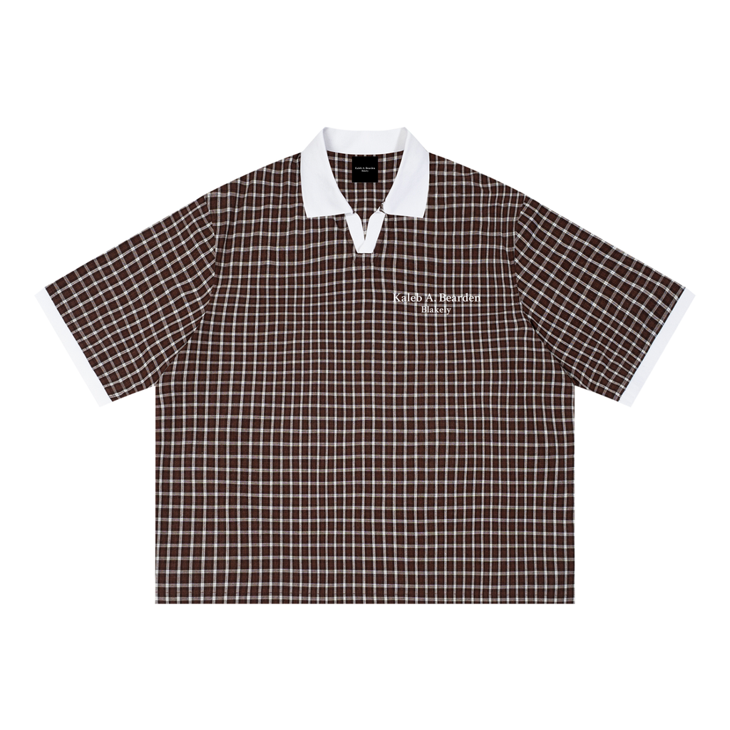ODMPOD grid check drop shoulder polo shirt with a relaxed fit, featuring a classic check pattern and casual style.