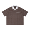ODMPOD grid check drop shoulder polo shirt with a relaxed fit, featuring a classic check pattern and casual style.