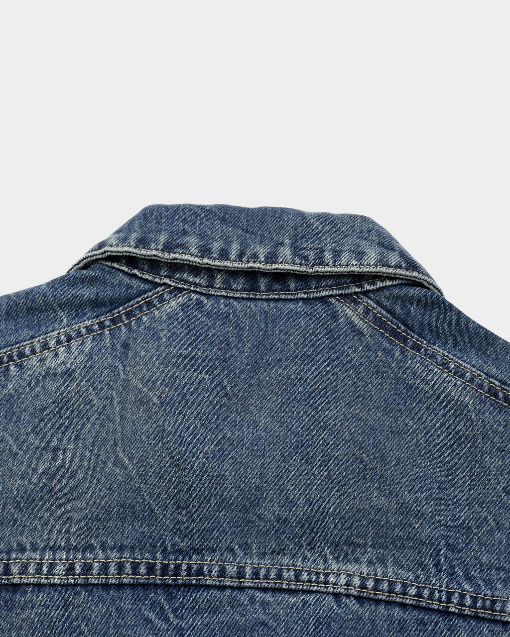 Washed denim jacket by Kaleb A. Bearden featuring a classic fit, light blue color, and casual style.