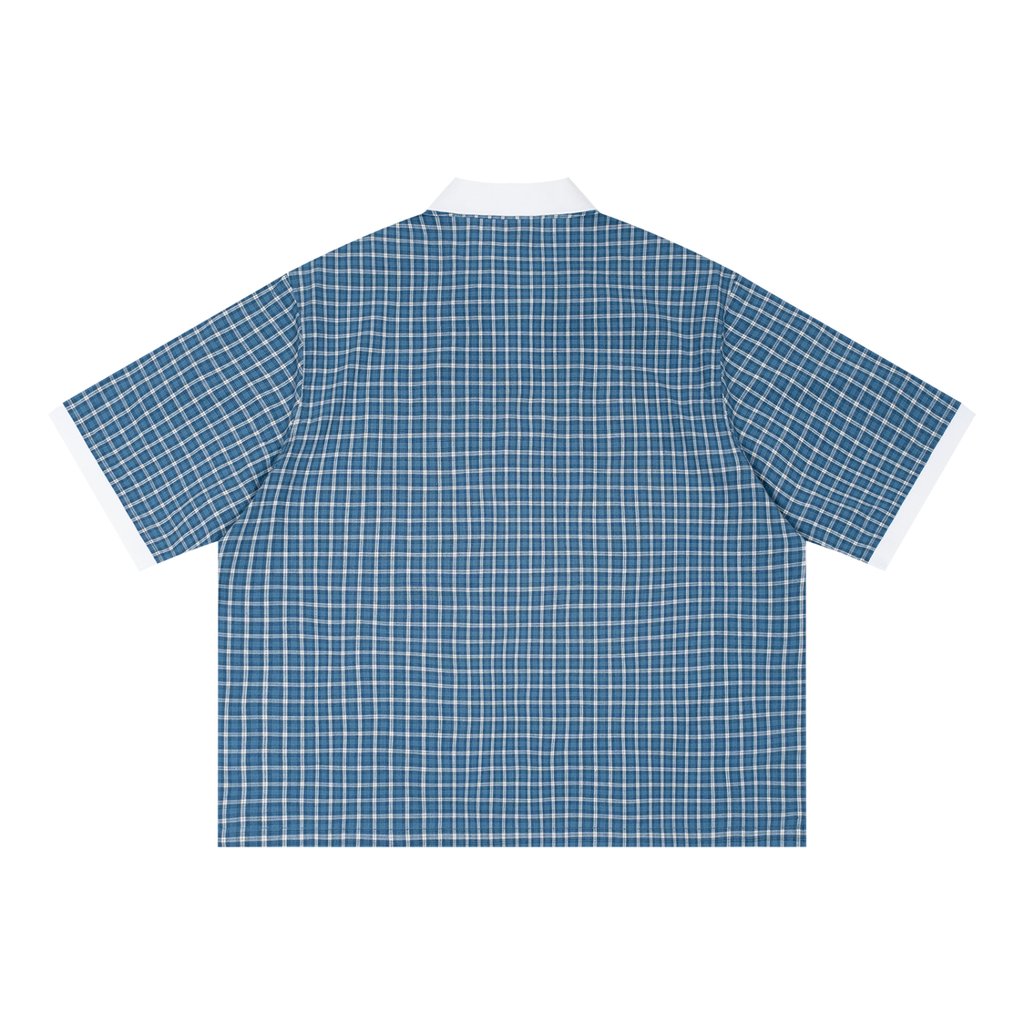 ODMPOD Grid Check Drop Shoulder Polo shirt with a classic check pattern and relaxed fit, displayed on a hanger.
