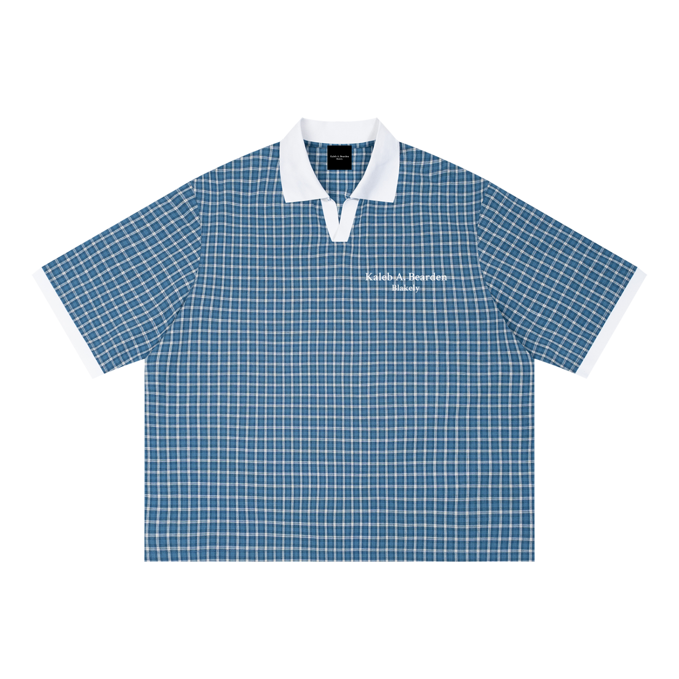 ODMPOD Grid Check Drop Shoulder Polo shirt with a classic check pattern and relaxed fit, displayed on a mannequin.