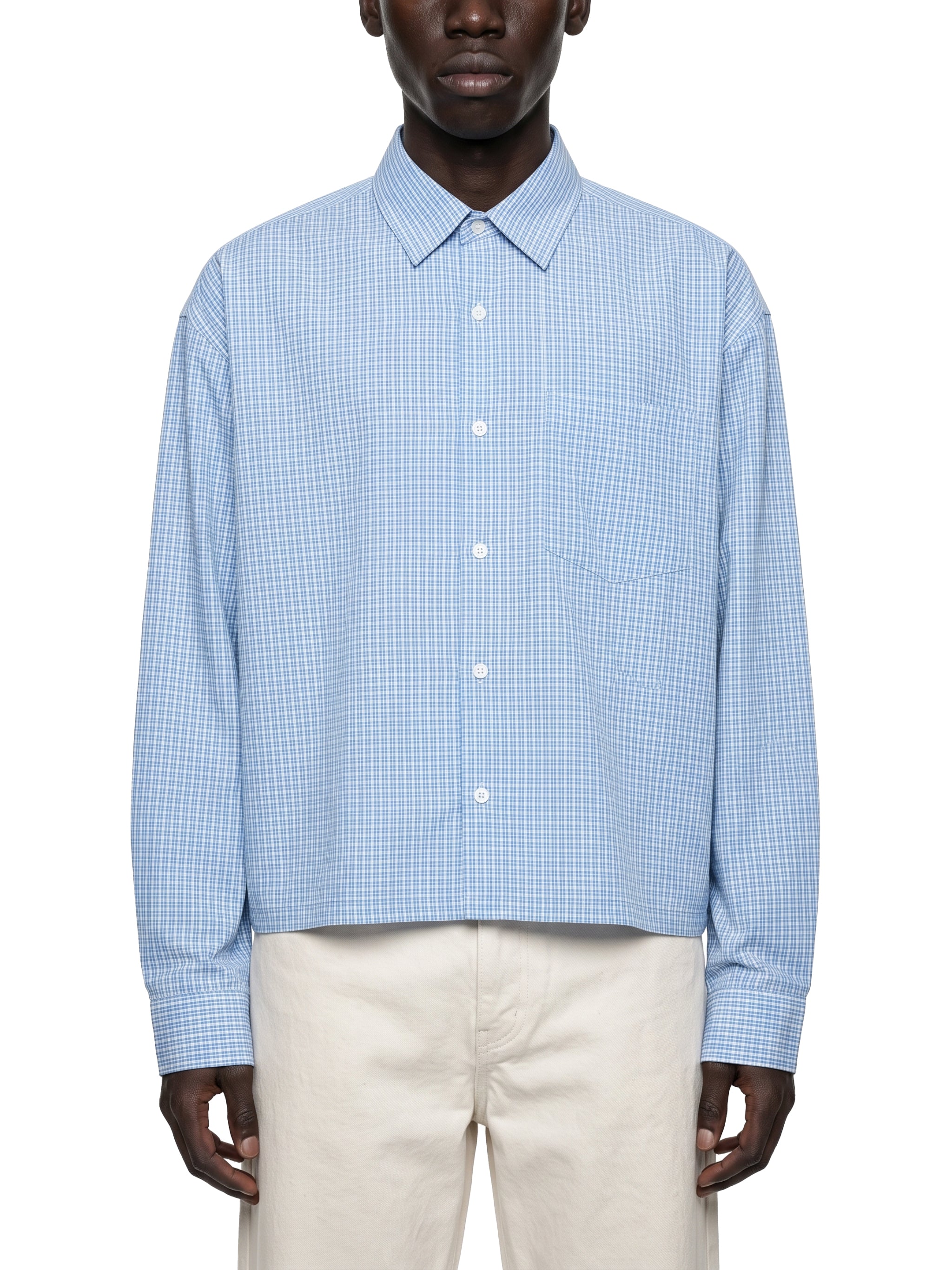 ODMPOD Road Services plaid drop shoulder shirt featuring a casual, relaxed fit with a plaid pattern and drop shoulder design.