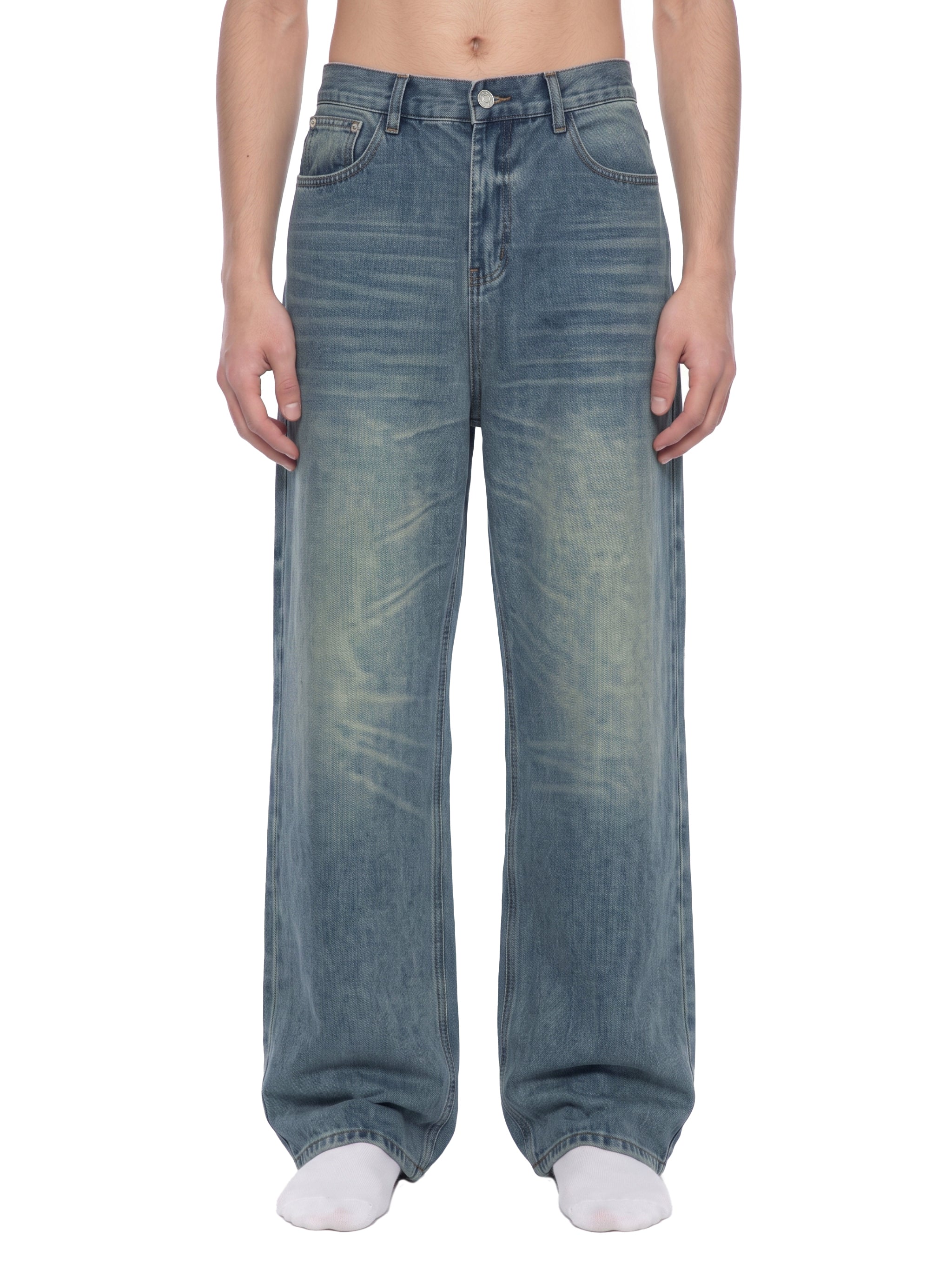 ODMPOD Sunfade Wide Leg Jean showing light wash denim, high-waisted fit, and wide-leg style with front pockets.
