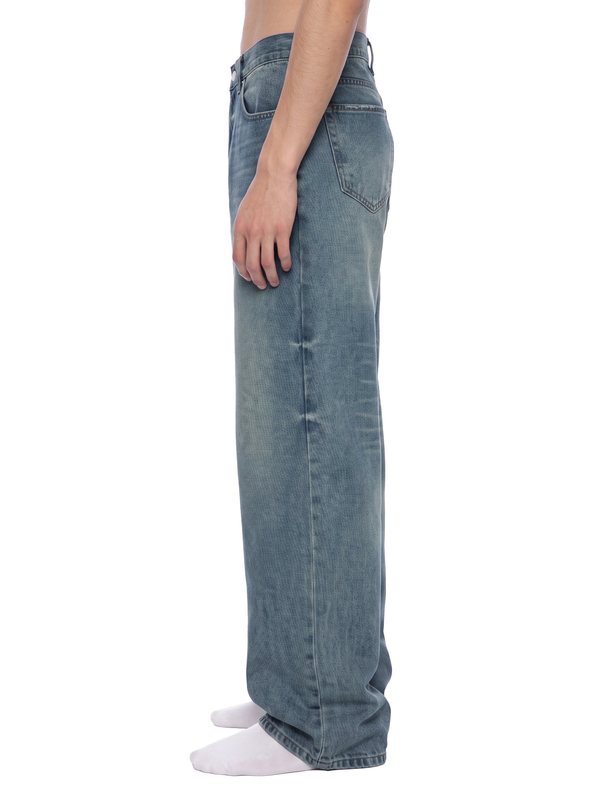 ODMPOD Sunfade Wide Leg Jean showing light wash denim and wide-leg style with visible stitching and relaxed fit.